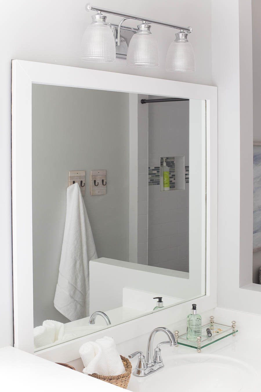 How to Frame a Bathroom Mirror - Budget Friendly DIY Project