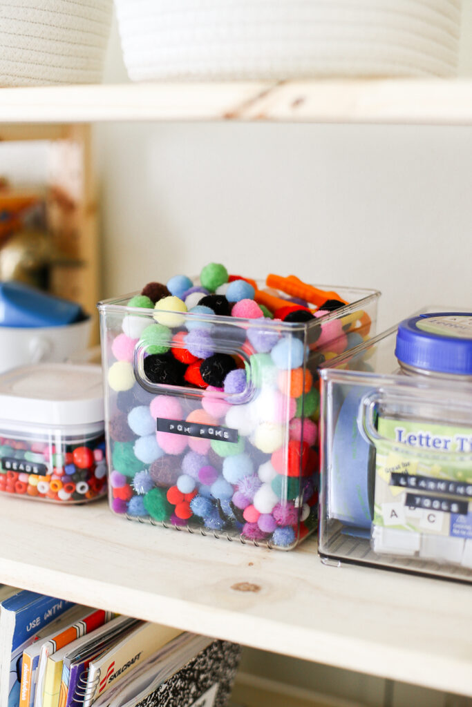 Kids playroom ideas - use clear containers and label art supplies.