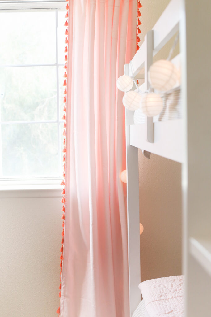 Pink velvet drapes in shared little girls bedroom