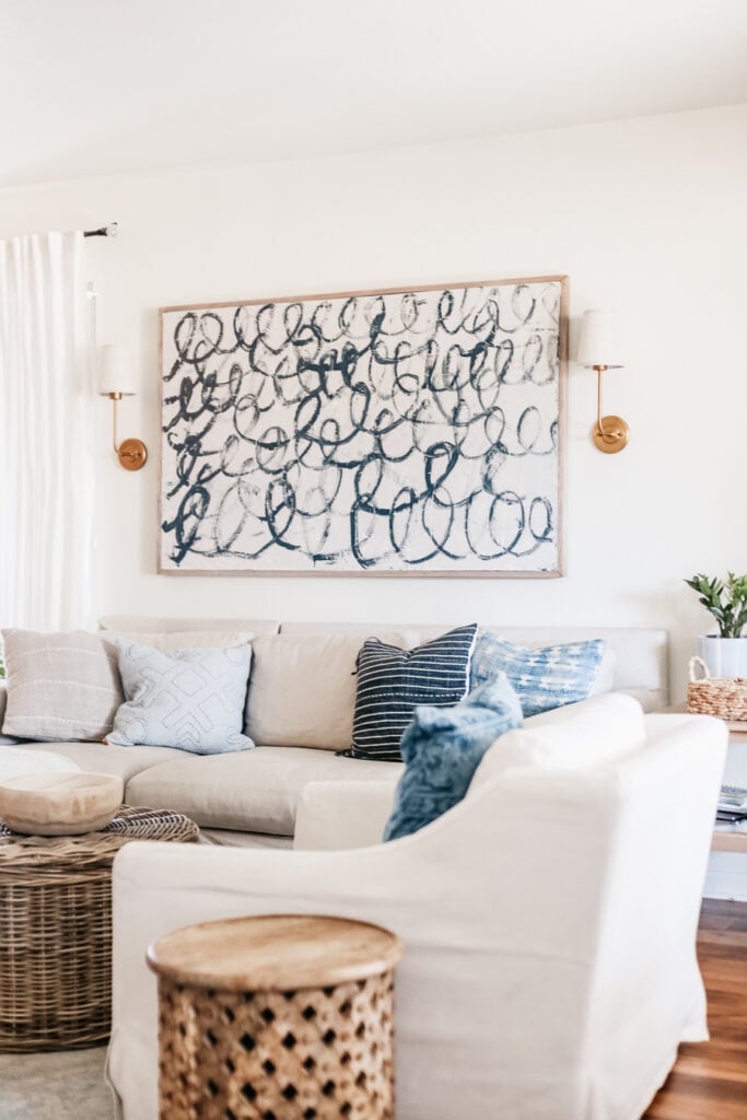 DIY Canvas Painting. Make a DIY oversized canvas from a drop cloth and then paint it to your liking.