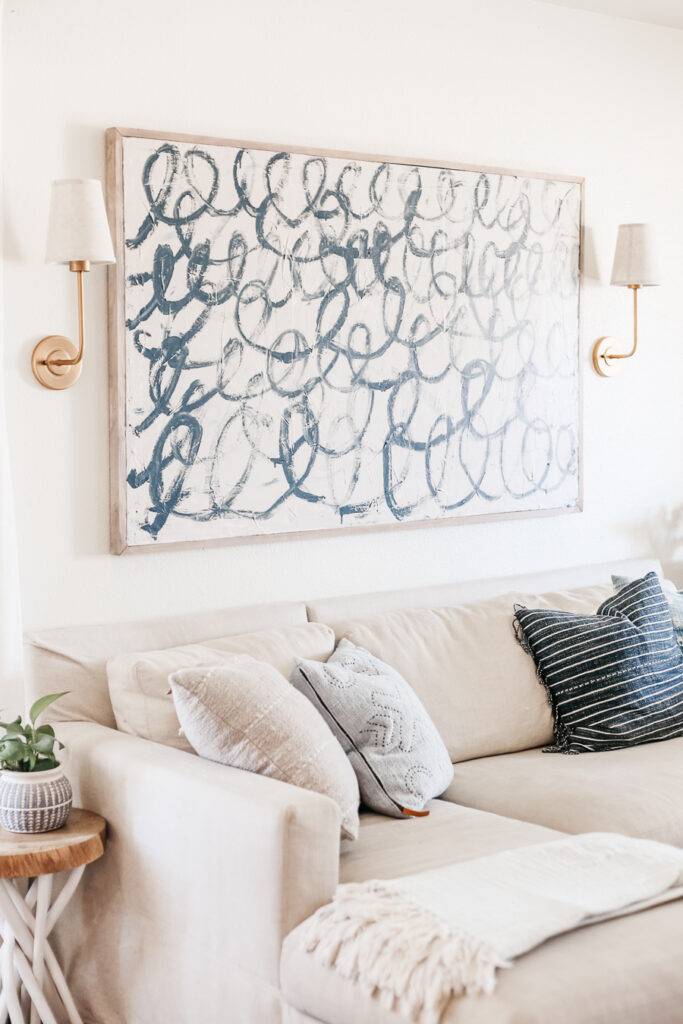 This DIY Canvas Painting Tutorial shares how to actually make a DIY Canvas. Budget friendly large scale art that you can create yourself.