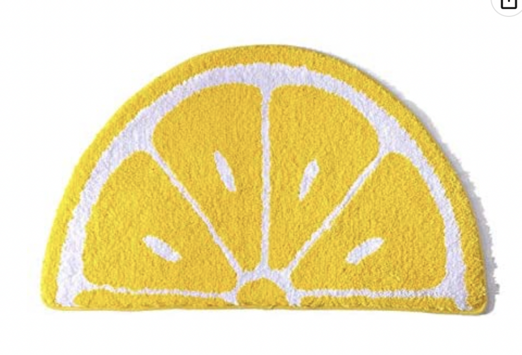 yellow and white plush lemon shaped rug.
