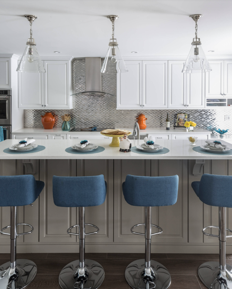 metal backsplash with white cabinets