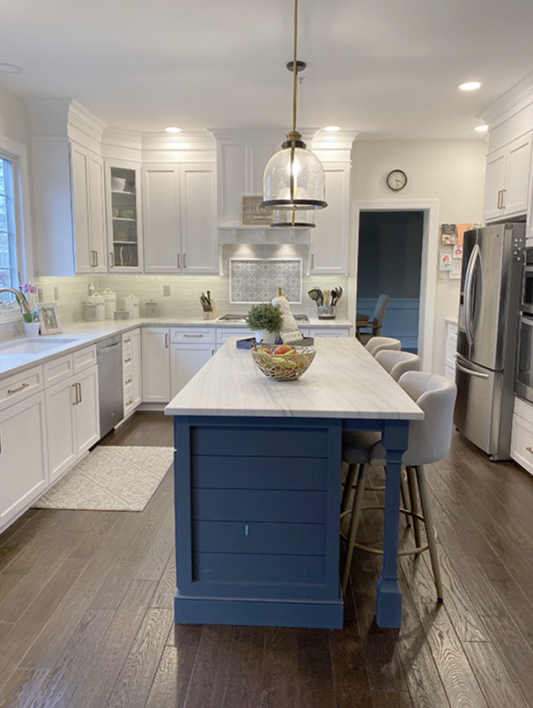 blue and white kitchen with blue kitchen island