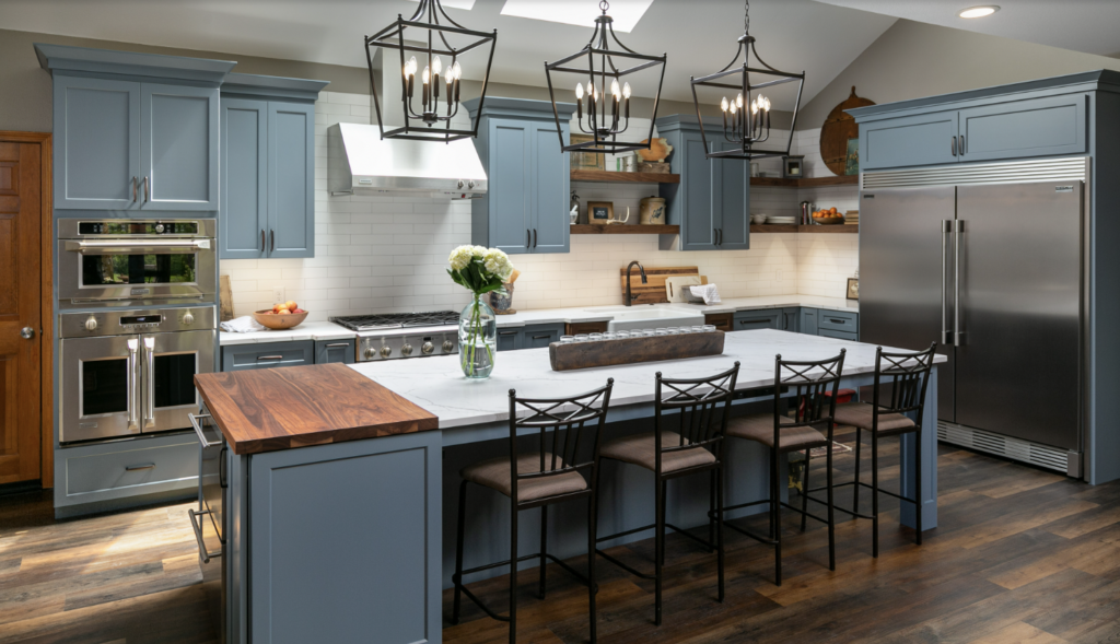 Sherwin Williams Foggy Day kitchen cabinets in a neutral blue kitchen