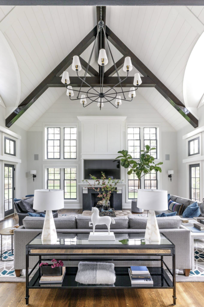 Great room living room with light gray walls color called Benjamin Moore Paper White