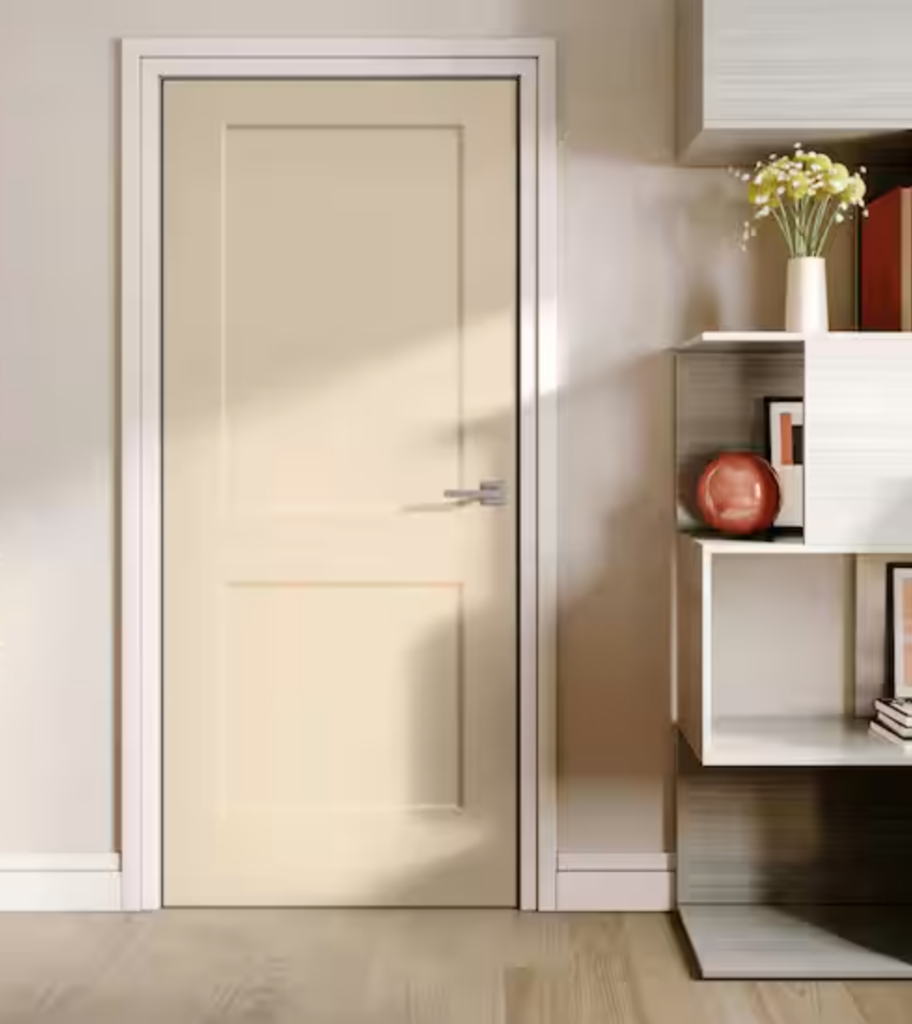 Beige interior painted door with white trim and beige walls.